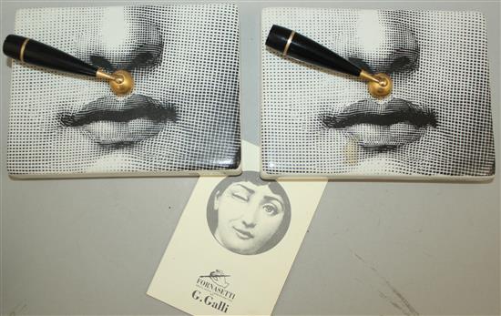 A collection of Fornasetti Temi e Variazioni and musical trophy pattern items,